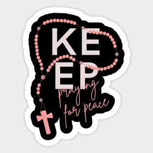 Keep Praying for Peace typography and rosary beads Sticker